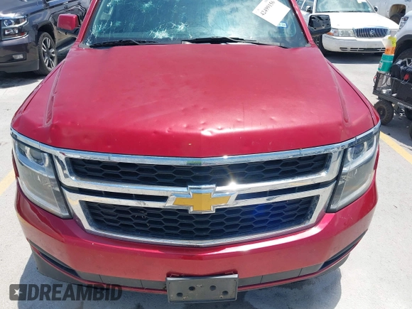 2015 Chevrolet Tahoe LS with VIN 1GNSCAEC4FR121571, listed as a IAAI auction lot 42499156 with 131,284 mi miles and . Bid and sale history available at DreamBid. Image 6.