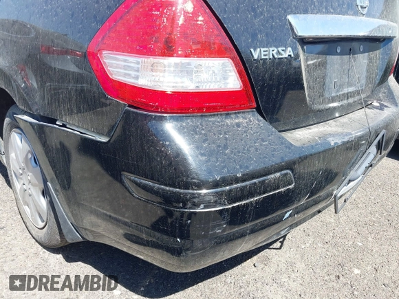 2009 Nissan Versa S with VIN 3N1BC11E19L440957, listed as a IAAI auction lot 40039437 with Not Provided miles and . Bid and sale history available at DreamBid. Image 15.