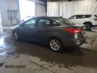 2015 Ford Focus SE with VIN 1FADP3F29FL310622, listed as a Copart auction lot 63591065 with 119,957 mi miles and Salvage title. Bid and sale history available at DreamBid. Image 2.