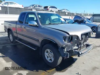 2001 Toyota Tundra SR5 with VIN 5TBRT34101S180512, listed as a IAAI auction lot 41802897 with 216,799 mi miles. Bid and sale history available at carsss.com. Image 1.