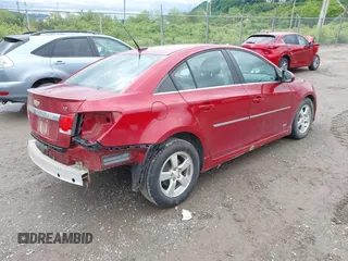 2014 Chevrolet Cruze 1LT z VIN 1G1PC5SB1E7191629, wystawiony jako IAAI lot #42341440 z przebiegiem 109 596 mil mil oraz . Historia ofert i sprzedaży dostępna na DreamBid. Obrazek 4.