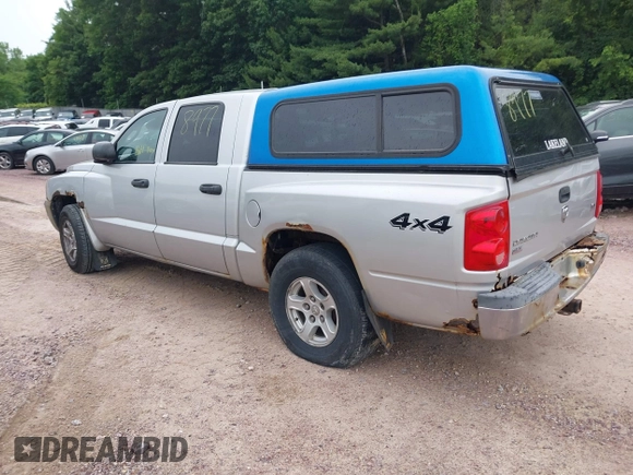 2005 Dodge Dakota SLT with VIN 1D7HW48N65S199887, listed as a IAAI auction lot 42508977 with 192,330 mi miles and . Bid and sale history available at DreamBid. Image 3.
