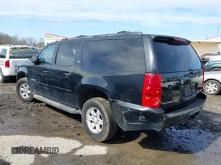 2014 GMC Yukon XL SLT with VIN 1GKS2KE77ER199723, listed as a IAAI auction lot 41555112 with 215,436 mi miles. Bid and sale history available at carsss.com. Image 3.
