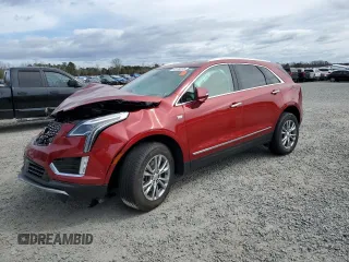 2022 Cadillac XT5 FWD Premium Luxury z VIN 1GYKNCRS9NZ130520, wystawiony jako Copart lot #47178275 z przebiegiem 8 564 mil mil oraz Szkoda całkowita • Salvage title. Historia ofert i sprzedaży dostępna na DreamBid. Obrazek 1.