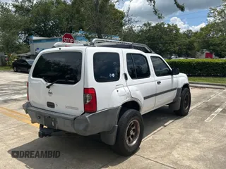 2003 Nissan Xterra SE with VIN 5N1ED28T33C685064, listed as a Copart auction lot 60668505 with 227,211 mi miles and Clean title. Bid and sale history available at DreamBid. Image 4.