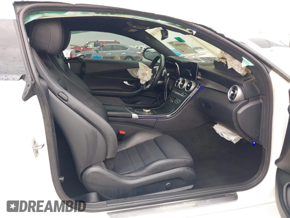 2021 Mercedes-Benz C 300 z VIN W1KWJ8EB9MG095256, wystawiony jako IAAI lot #41938967 z przebiegiem 26 404 mil mil oraz . Historia ofert i sprzedaży dostępna na DreamBid. Obrazek 5.