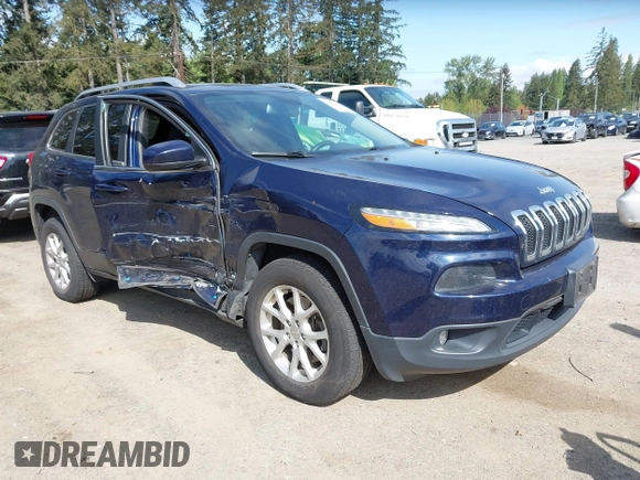2015 Jeep Cherokee Latitude with VIN 1C4PJMCB0FW702535, listed as a IAAI auction lot 42149898 with 125,938 mi miles and . Bid and sale history available at carsss.com. Image 1.