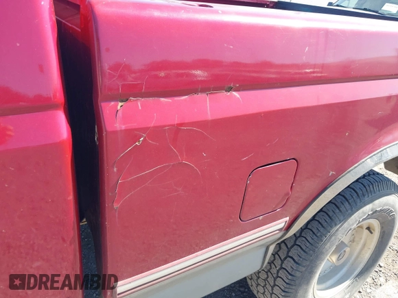 1995 Ford F-150 z VIN 1FTEX14H6SKB75447, wystawiony jako IAAI lot #40212118 z przebiegiem 205 880 mil mil oraz . Historia ofert i sprzedaży dostępna na DreamBid. Obrazek 15.