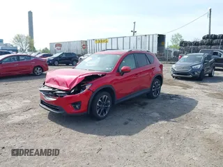 2016 Mazda CX-5 Grand Touring with VIN JM3KE4DY9G0850583, listed as a IAAI auction lot 42075545 with 92,789 mi miles and . Bid and sale history available at carsss.com. Image 17.