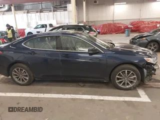 2020 Acura TLX w/Technology Pkg with VIN 19UUB1F58LA001692, listed as a IAAI auction lot 41562503 with 70,664 mi miles. Bid and sale history available at carsss.com. Image 13.