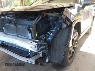 2022 Toyota RAV4 Hybrid SE with VIN 2T3T6RFVXNW033965, listed as a IAAI auction lot 42368450 with 27,377 mi miles and . Bid and sale history available at DreamBid. Image 6.