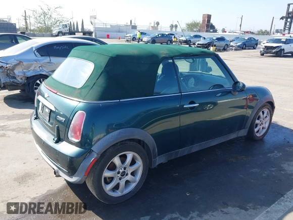 2006 MINI Convertible with VIN WMWRF33566TG15710, listed as a IAAI auction lot 41636955 with Not Provided miles and . Bid and sale history available at DreamBid. Image 4.