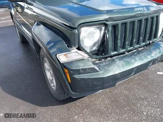 2011 Jeep Liberty Sport with VIN 1J4PN2GK9BW552545, listed as a IAAI auction lot 41815352 with 148,993 mi miles. Bid and sale history available at carsss.com. Image 6.