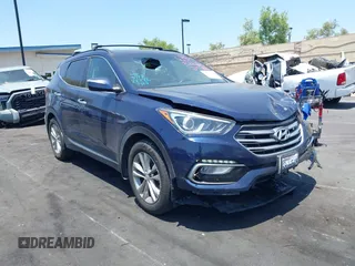 2018 Hyundai Santa Fe 2.0T z VIN 5XYZU4LA8JG537427, wystawiony jako IAAI lot #42349692 z przebiegiem 148 764 mil mil oraz . Historia ofert i sprzedaży dostępna na DreamBid. Obrazek 1.