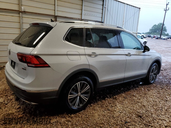 2018 Volkswagen Tiguan SEL z VIN 3VV2B7AX3JM009637, wystawiony jako Copart lot #59373325 z przebiegiem 148 046 mil mil oraz Szkoda całkowita • Salvage title. Historia ofert i sprzedaży dostępna na DreamBid. Obrazek 3.