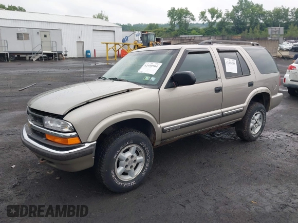 2000 Chevrolet Blazer LT with VIN 1GNDT13W9YK287456, listed as a IAAI auction lot 42450504 with 139,649 mi miles and . Bid and sale history available at DreamBid. Image 17.