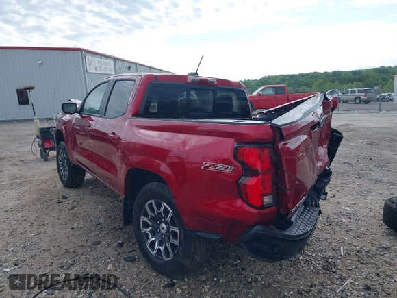 2023 Chevrolet Colorado 4WD Z71 z VIN 1GCPTDEK5P1229334, wystawiony jako IAAI lot #42201772 z przebiegiem Nie podano mil oraz . Historia ofert i sprzedaży dostępna na DreamBid. Obrazek 3.