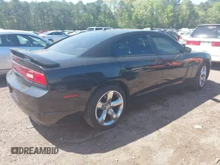 2013 Dodge Charger SE with VIN 2C3CDXBGXDH643384, listed as a IAAI auction lot 41977909 with 124,666 mi miles. Bid and sale history available at carsss.com. Image 4.