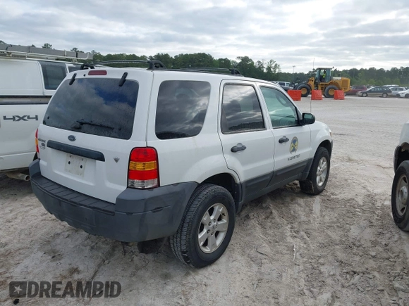2006 Ford Escape XLT with VIN 1FMYU93196KC72975, listed as a IAAI auction lot 42088686 with 75,440 mi miles and . Bid and sale history available at DreamBid. Image 4.