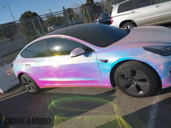 2021 Tesla Model 3 Long Range with VIN 5YJ3E1EB6MF053940, listed as a IAAI auction lot 41344978 with 38,544 mi miles and . Bid and sale history available at DreamBid. Image 13.