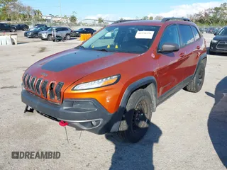 2014 Jeep Cherokee Trailhawk with VIN 1C4PJMBS4EW254879, listed as a IAAI auction lot 41550356 with 101,077 mi miles. Bid and sale history available at carsss.com. Image 22.