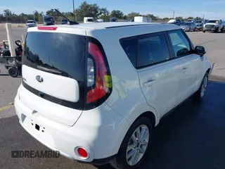 2018 Kia Soul + with VIN KNDJP3A50J7603244, listed as a IAAI auction lot 41670375 with 121,528 mi miles. Bid and sale history available at carsss.com. Image 4.