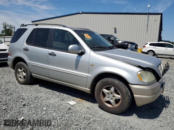 2001 Mercedes-Benz M-Class with VIN 4JGAB54EX1A271687, listed as a Copart auction lot 57046944 with 209,561 mi miles and Salvage Title. Bid and sale history available at carsss.com. Image 4.