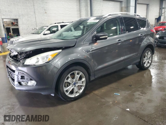 2015 Ford Escape Titanium with VIN 1FMCU9J90FUA26808, listed as a Copart auction lot 54449805 with 184,576 mi miles and Salvage title. Bid and sale history available at DreamBid. Image 1.