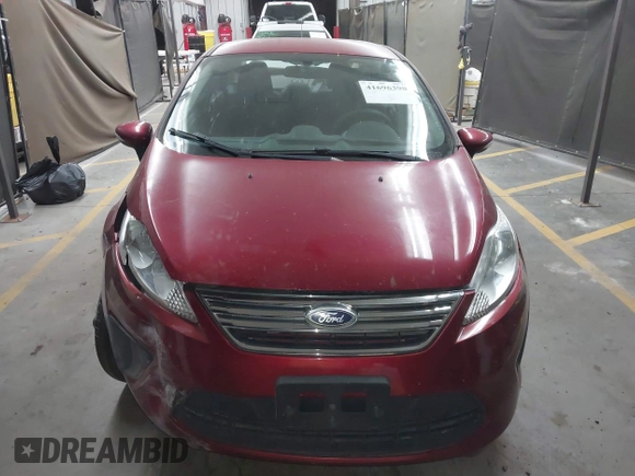 2013 Ford Fiesta SE z VIN 3FADP4BJ9DM167508, wystawiony jako IAAI lot #41696390 z przebiegiem Nie podano mil oraz . Historia ofert i sprzedaży dostępna na DreamBid. Obrazek 12.