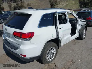 2021 Jeep Grand Cherokee Laredo X with VIN 1C4RJEAG3MC714500, listed as a IAAI auction lot 41637602 with 71,537 mi miles. Bid and sale history available at carsss.com. Image 4.