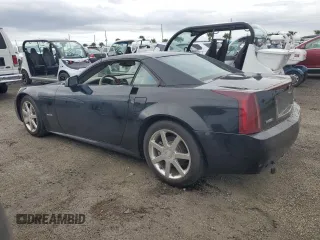 2004 Cadillac XLR z VIN 1G6YV34A445600668, wystawiony jako Copart lot #74595824 z przebiegiem Nie podano mil oraz Szkody całkowita. Historia ofert i sprzedaży dostępna na DreamBid. Obrazek 2.