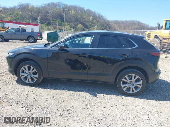 2023 Mazda CX-30 S Carbon Edition with VIN 3MVDMBCM1PM509987, listed as a IAAI auction lot 42060833 with 14,140 mi miles and . Bid and sale history available at DreamBid. Image 14.