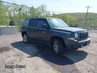 2014 Jeep Patriot Latitude with VIN 1C4NJRFB3ED803417, listed as a IAAI auction lot 42175179 with 210,791 mi miles. Bid and sale history available at carsss.com. Image 1.