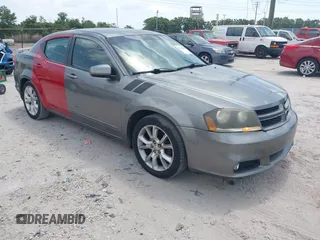 2013 Dodge Avenger R/T with VIN 1C3CDZBG4DN590183, listed as a IAAI auction lot 42178040 with 150,265 mi miles. Bid and sale history available at carsss.com. Image 1.
