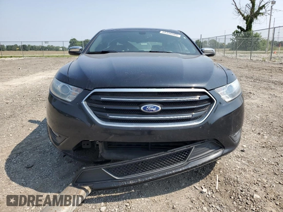 2013 Ford Taurus Limited z VIN 1FAHP2F80DG210284, wystawiony jako Copart lot #60356585 z przebiegiem 163 750 mil mil oraz Szkoda całkowita • Salvage title. Historia ofert i sprzedaży dostępna na DreamBid. Obrazek 5.