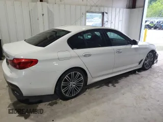 2018 BMW 5 Series 540i xDrive with VIN WBAJE7C53JWC54662, listed as a Copart auction lot 63703595 with 96,523 mi miles and Salvage title. Bid and sale history available at DreamBid. Image 3.