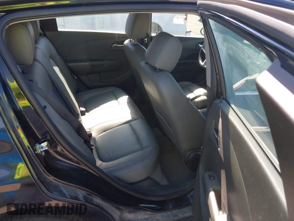 2015 Chevrolet Sonic LTZ with VIN 1G1JE6SB8F4116693, listed as a IAAI auction lot 42865997 with 102,961 mi miles and . Bid and sale history available at DreamBid. Image 8.
