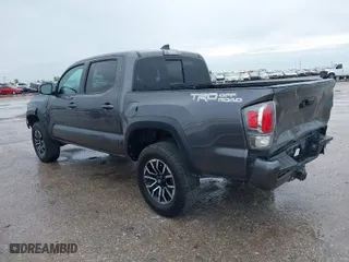 2021 Toyota Tacoma 2WD SR5 with VIN 5TFAZ5CNXMX097509, listed as a IAAI auction lot 41889399 with 81,598 mi miles. Bid and sale history available at carsss.com. Image 3.