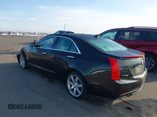 2014 Cadillac ATS Standard RWD with VIN 1G6AA5RA7E0100973, listed as a IAAI auction lot 41795657 with 93,807 mi miles and . Bid and sale history available at DreamBid. Image 3.
