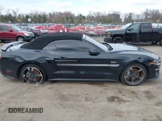 2021 Ford Mustang GT Premium with VIN 1FATP8FF4M5143096, listed as a IAAI auction lot 42013344 with 20,221 mi miles and . Bid and sale history available at DreamBid. Image 13.