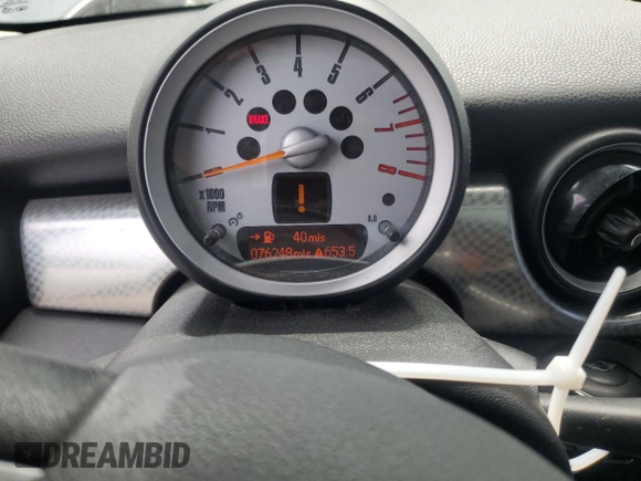 2007 MINI Hardtop S with VIN WMWMF73577TT84087, listed as a Copart auction lot 60208895 with 76,248 mi miles and Salvage title. Bid and sale history available at DreamBid. Image 9.