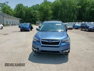 2017 Subaru Forester Touring z VIN JF2SJAWC9HH564242, wystawiony jako Copart lot #59209265 z przebiegiem Nie podano mil oraz Szkoda całkowita • Salvage title. Historia ofert i sprzedaży dostępna na DreamBid. Obrazek 15.
