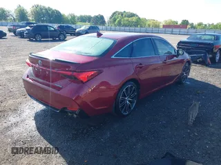 2019 Toyota Avalon XLE with VIN 4T1BZ1FB6KU013498, listed as a IAAI auction lot 42085943 with 61,851 mi miles. Bid and sale history available at carsss.com. Image 4.