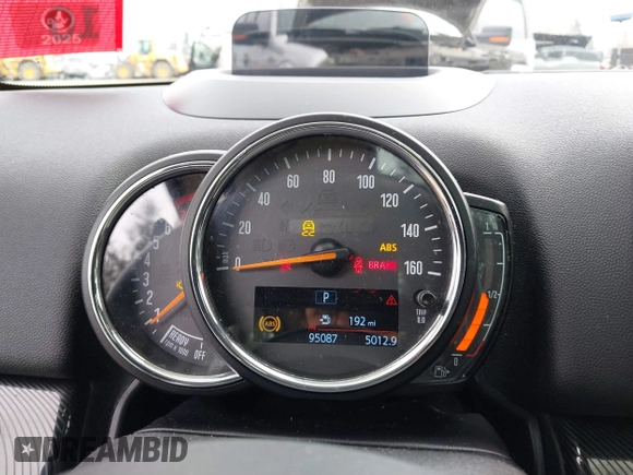 2019 MINI Countryman Cooper S z VIN WMZYT5C54K3G92704, wystawiony jako IAAI lot #41821521 z przebiegiem 95 087 mil mil oraz . Historia ofert i sprzedaży dostępna na DreamBid. Obrazek 7.