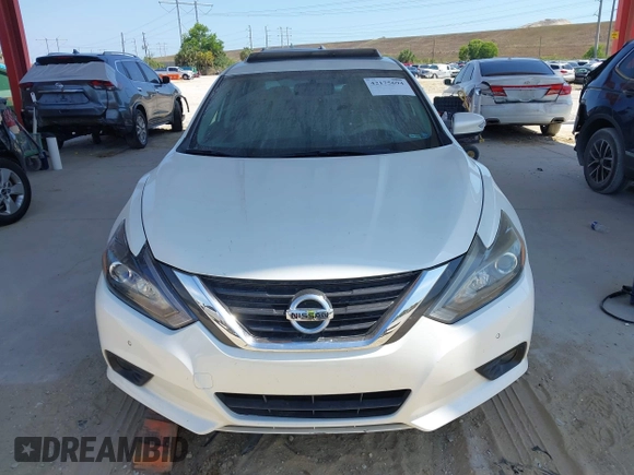 2016 Nissan Altima SL z VIN 1N4BL3AP0GC164425, wystawiony jako IAAI lot #42175694 z przebiegiem 106 255 mil mil oraz . Historia ofert i sprzedaży dostępna na DreamBid. Obrazek 12.