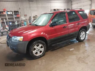 2005 Ford Escape XLT with VIN 1FMYU03115KA75972, listed as a IAAI auction lot 42058791 with 205,005 mi miles and . Bid and sale history available at DreamBid. Image 2.