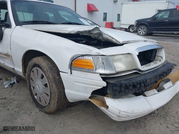 2010 Ford Police Interceptor with VIN 2FABP7BV6AX128399, listed as a IAAI auction lot 41433187 with 196,476 mi miles. Bid and sale history available at carsss.com. Image 6.
