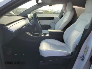 2021 Tesla Model Y Standard Range z VIN 5YJYGDED4MF107030, wystawiony jako Copart lot #66382913 z przebiegiem 39 024 mil mil oraz Szkoda całkowita • Salvage title. Historia ofert i sprzedaży dostępna na DreamBid. Obrazek 7.