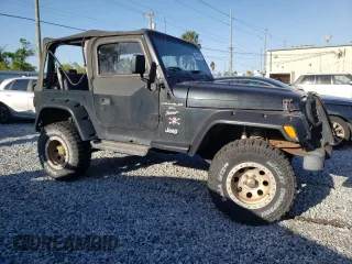 1999 Jeep Wrangler Sport with VIN 1J4FY19S6XP483793, listed as a Copart auction lot 49443725 with 118,225 mi miles and Clean Title. Bid and sale history available at carsss.com. Image 4.