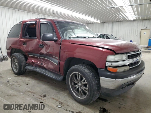 2002 Chevrolet Tahoe LS with VIN 1GNEC13T02R228644, listed as a Copart auction lot 55672545 with 245,005 mi miles and Non repairable. Bid and sale history available at DreamBid. Image 4.